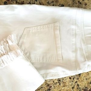 White jeans with fringe